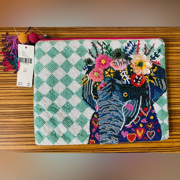 Anthropologie Handbags - Anthropologie Beaded Elephant Pouch clutch bag.